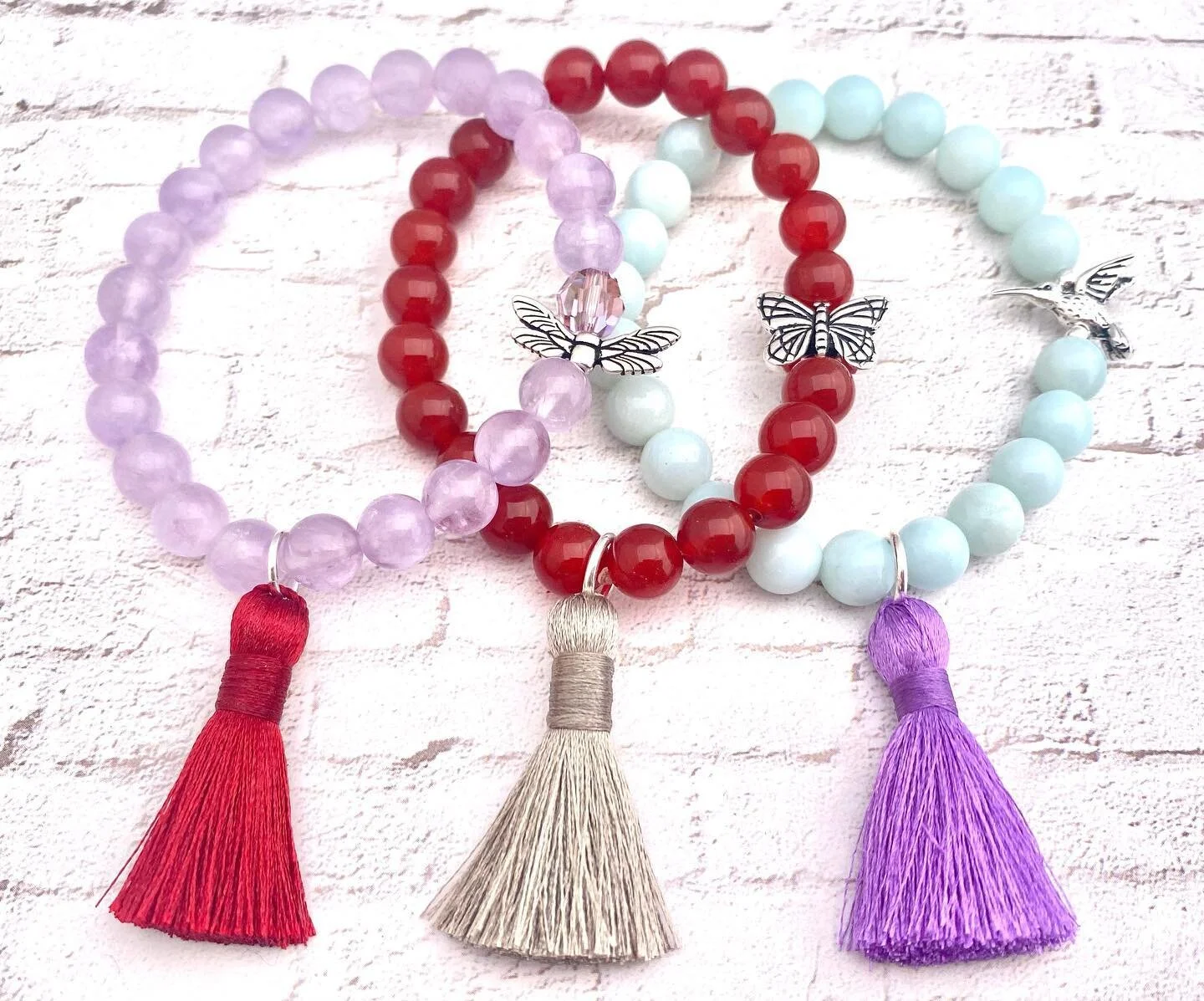 Tassels!  Oh-and Things With Wings!  #hummingbird #butterfly #dragonfly #lavenderamethyst #amazonite #carnelian Have an amazing day please!  @lotusandlava #lotusandlava lotusandlava.com