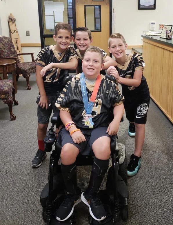 10 year old with cerebral palsy achieves dream of scoring a touchdown