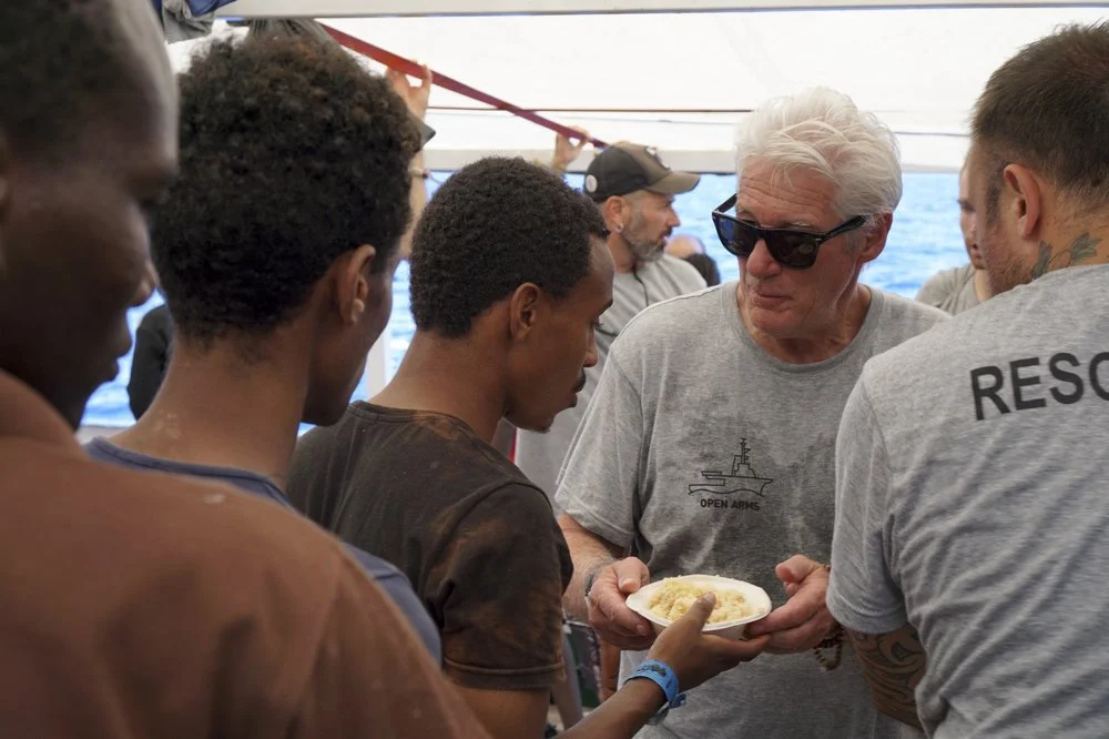 Richard Gere delivers food and supplies to stranded migrants on humanitarian ship