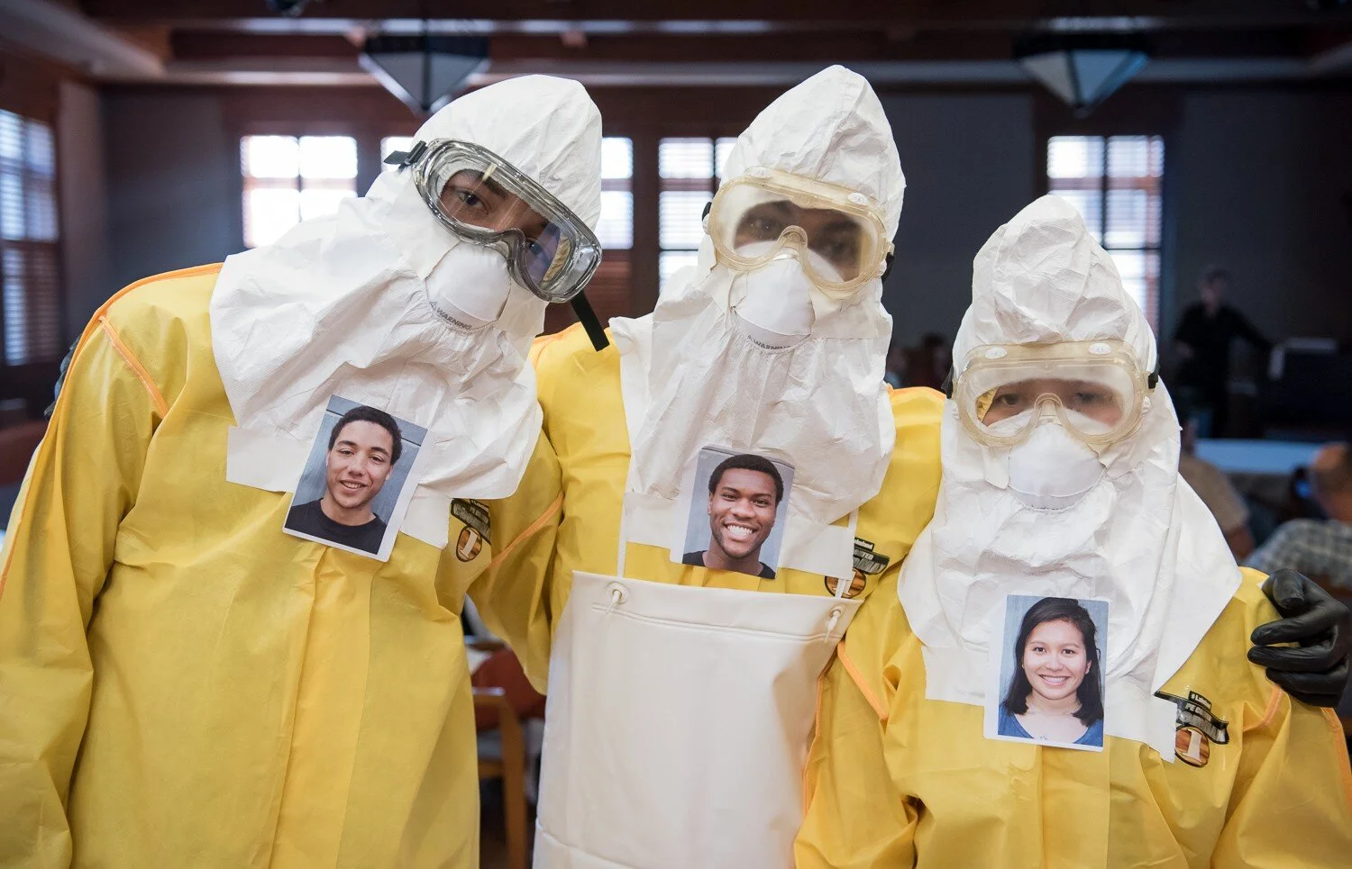 Healthcare workers are taping pictures of themselves smiling to reassure patients