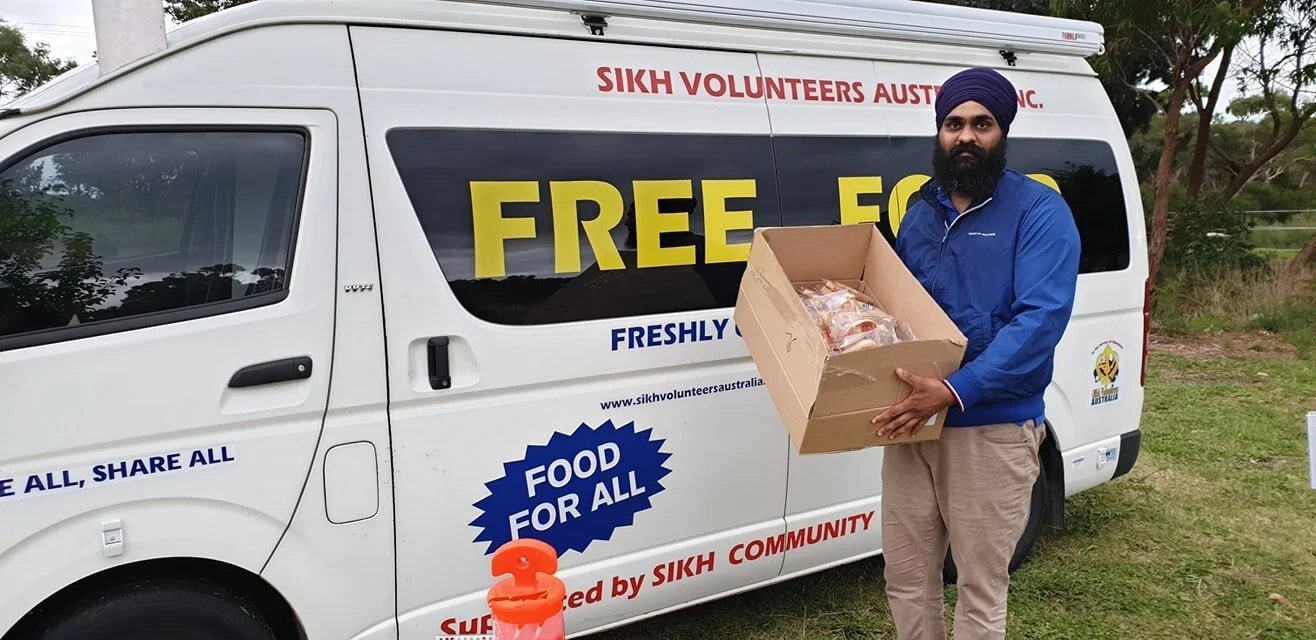 Sikh volunteers in Australia cook and deliver thousand meals a day to those in need