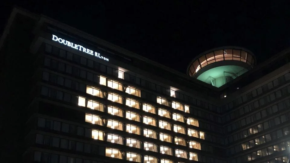 Virginia hotel lights up empty rooms with messages of hope for commuters