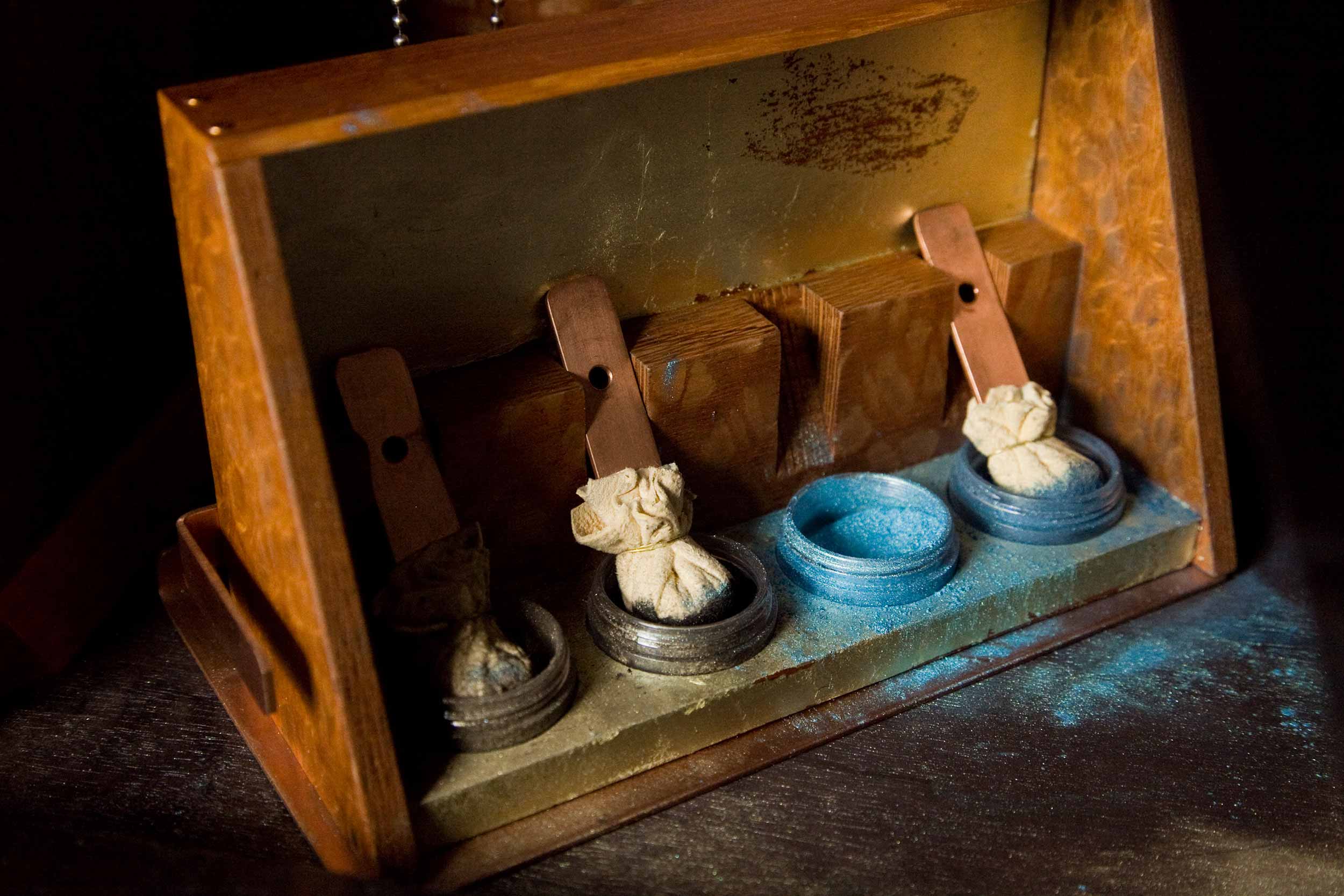 Hidden chamber with initiation powders