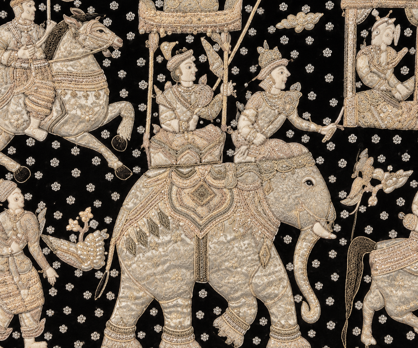 Kalaga textiles are known for their elaborate handwork, combining metallic threads, beads, sequins, stones and padded appliqué against a dark velvet or cloth ground