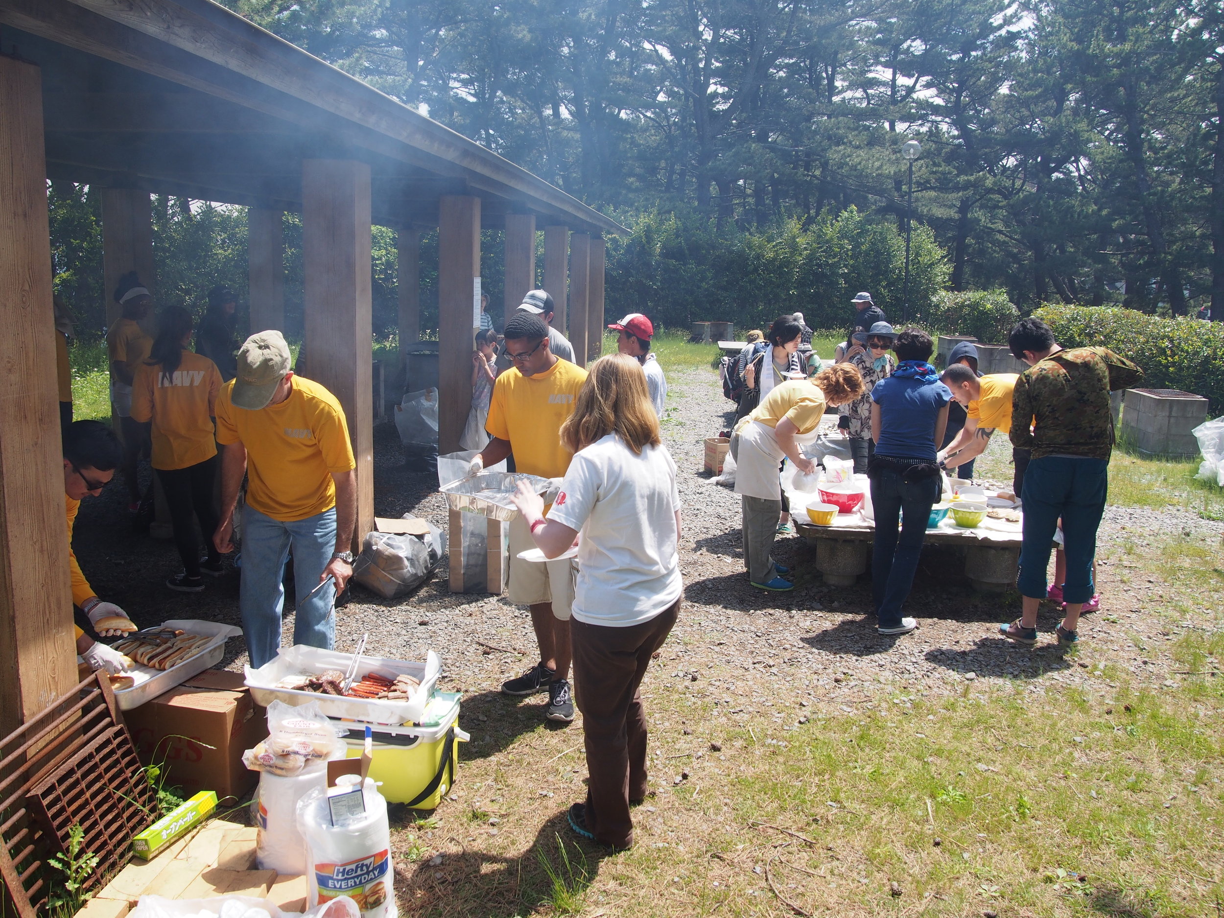 BBQ preparations underway by volunteers.