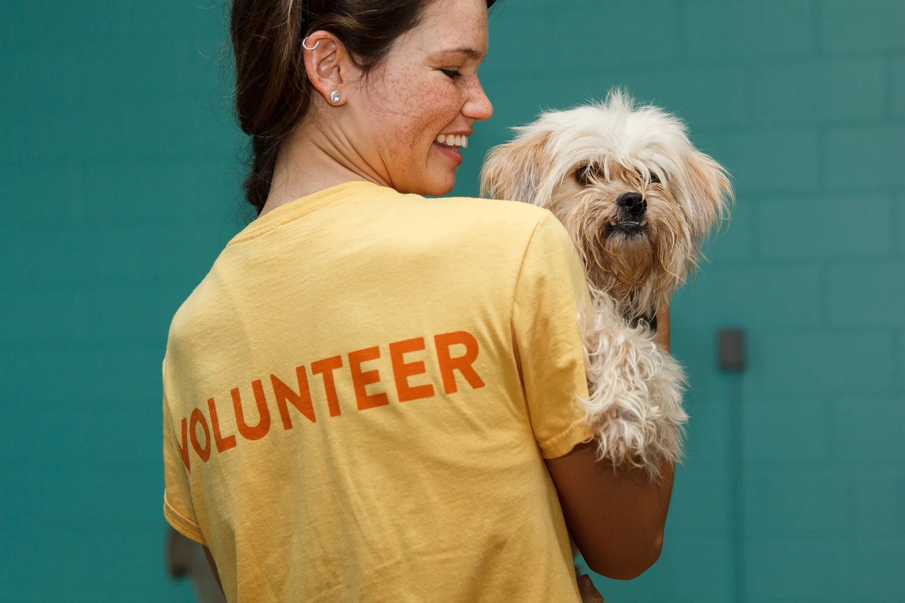 Pet Alliance of Greater Orlando volunteer with dog