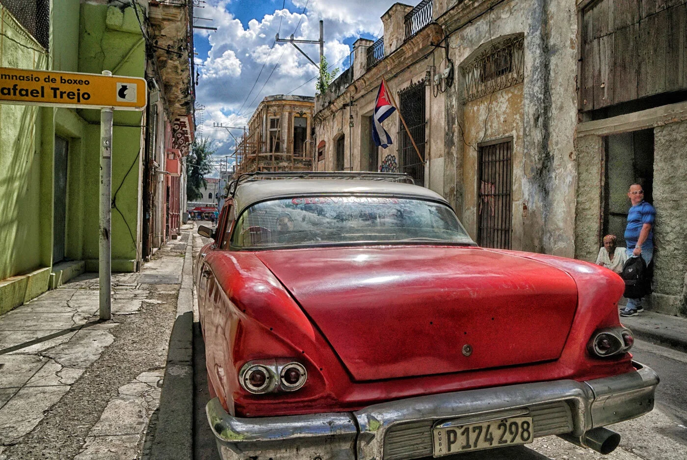 Honorable Mention- Marcia Geier	Red Car Outside Gym Trejo $349