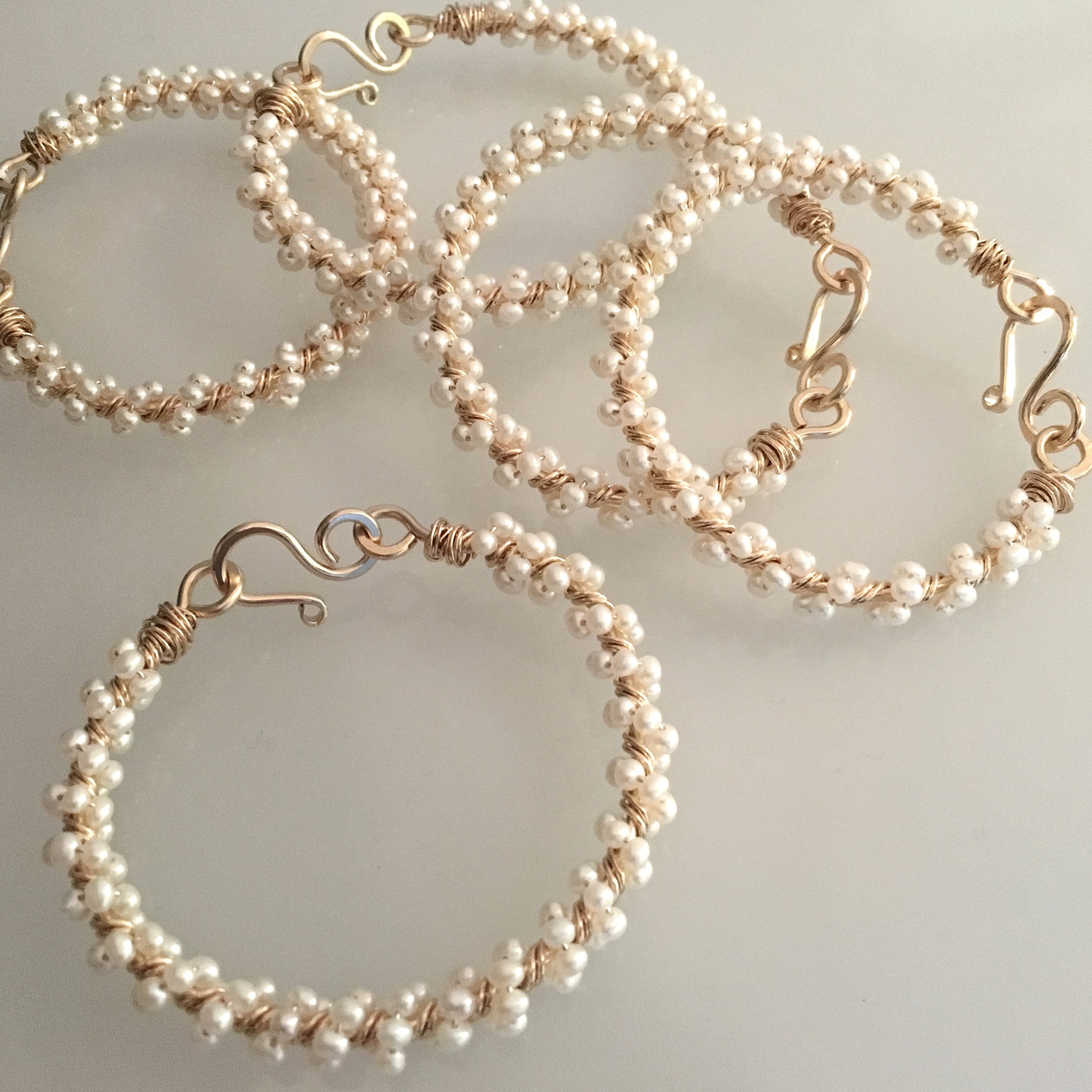 golden pearls bracelets.jpeg