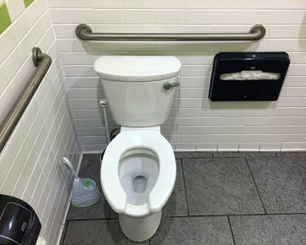 This Is Why Public Toilet Seats Are Shaped Like a U