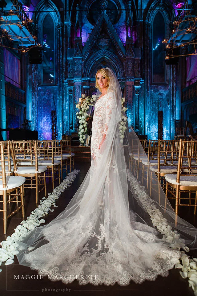 The bride wears Zuhair Murad