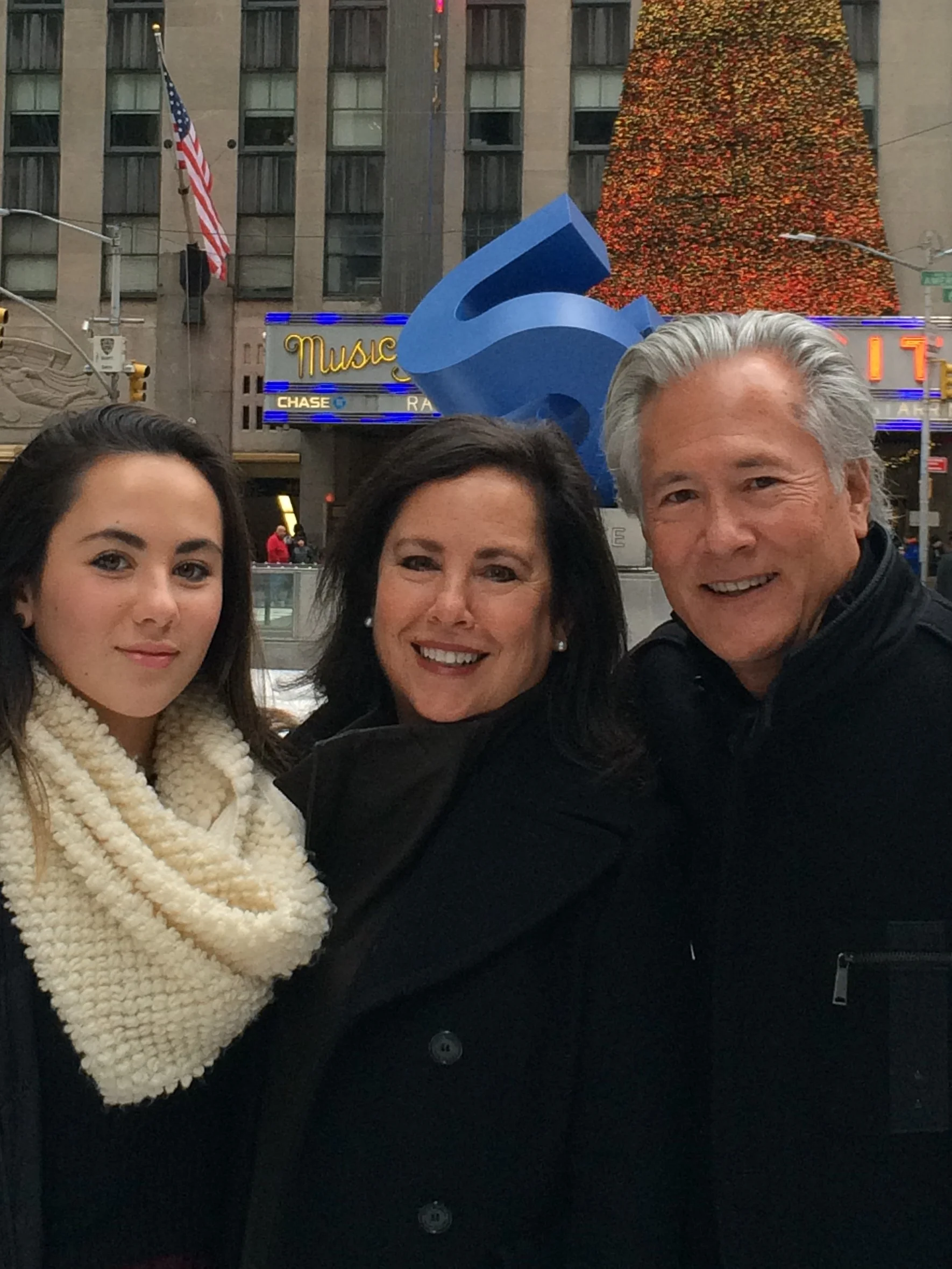 Photo of Melissa with daughter Ann Louise and husband Bob