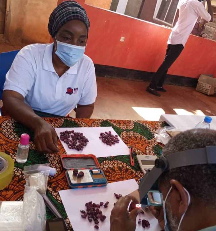 moyo female miners at market day.PNG