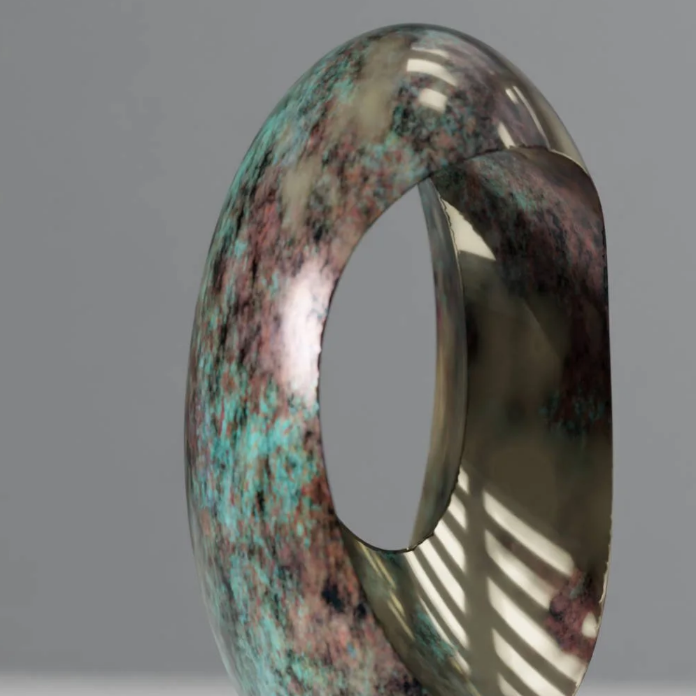 A modern sculpture made of polished stone with a mix of pink, green, black, and white colors, hanging in the shape of a teardrop and mounted on a black base.