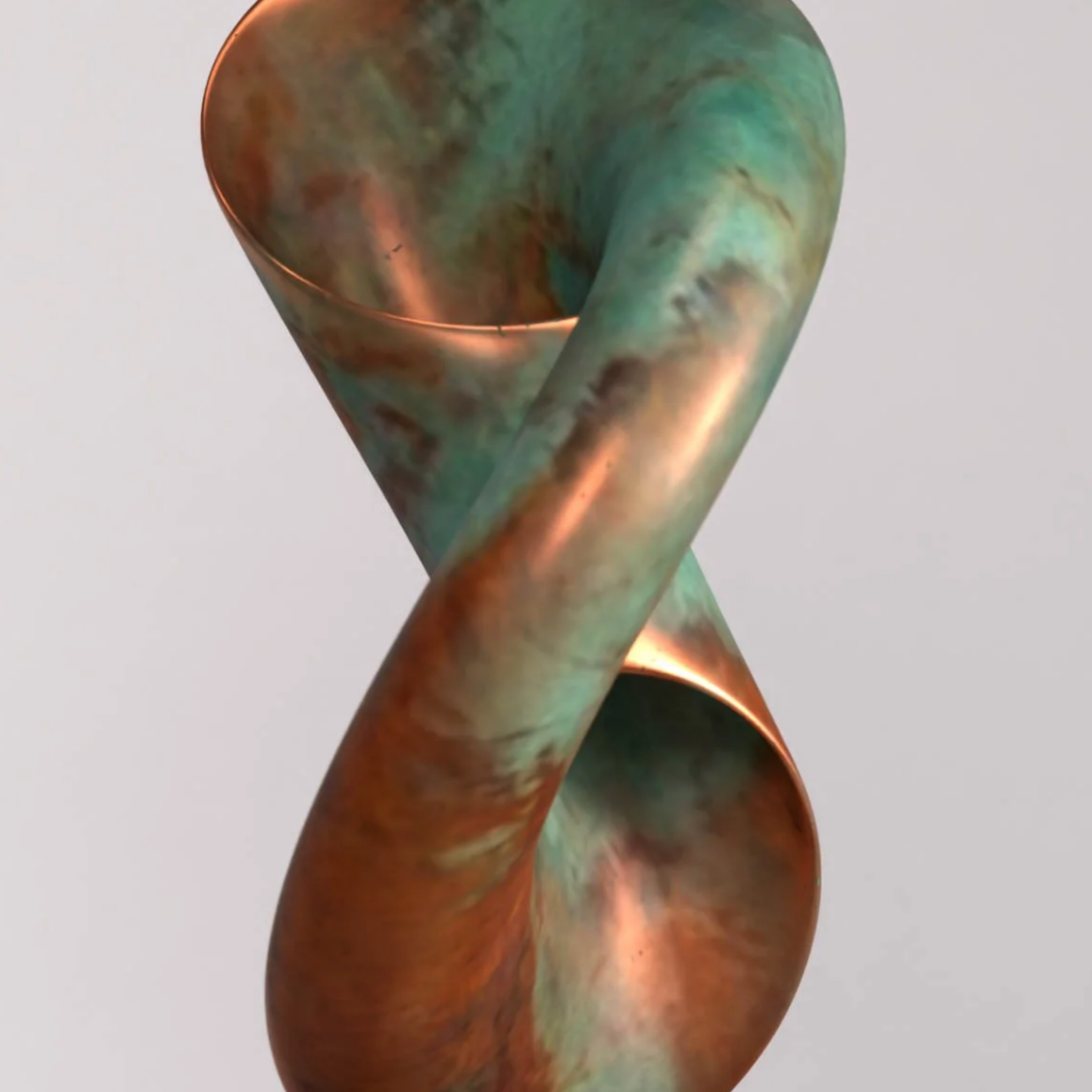 Sculpture of a twisted, colorful abstract form with a patina finish, displayed on a black pedestal against a plain background.