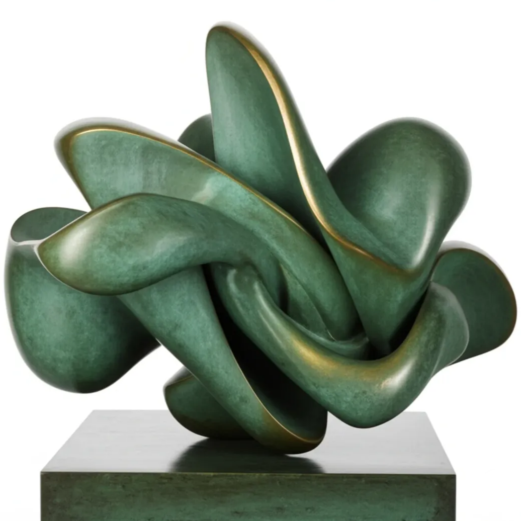 Green abstract sculpture with smooth, curved shapes mounted on a rectangular base.