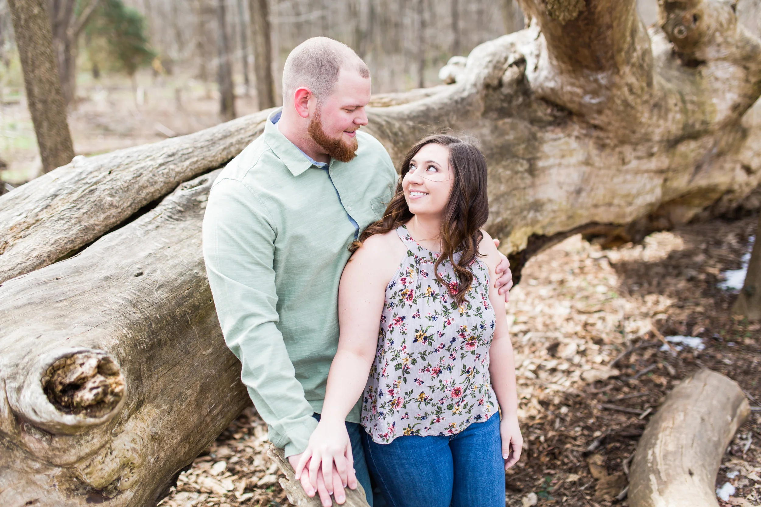 Andrew proposed to Breanna on December 3, 2017 while they were out to dinner at one of their favorite places. Even though she said no to dessert, the waitress still brought them a piece of cheesecake with the date written in chocolate, which made Breanna a little suspicious. She turned to see Andrew down on one knee, asking her to marry him! He chose a beautiful round cut ring in a pave setting, and it just sparkles in every picture. Dessert seems like a pretty great way to start out on the journey towards marriage, if you ask me! They are getting married in a rustic barn ceremony in Louisville, Kentucky, on September 22nd of this year. I had a wonderful time capturing the sweetness these two share. Please show this beautiful couple some love!