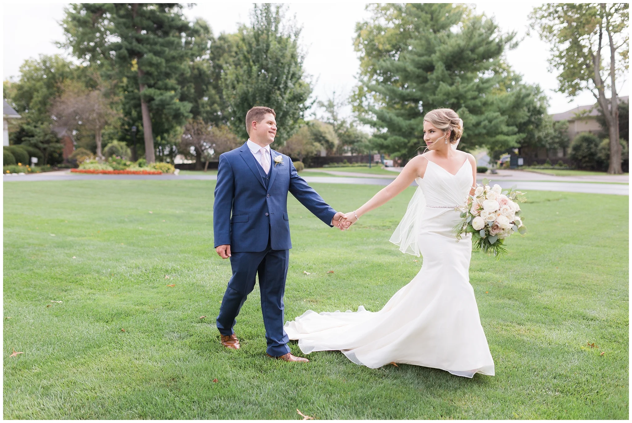 Fields and Emily attended the same high school and grew up just a few miles apart, but they weren’t introduced until Fields’ younger sister Lucy suggested the idea. They had their first date at La Finca Mexican Restaurant and had Crisp’s Dairy Treat for dessert (an Ashland essential for summertime romance)… and they clicked instantly! He proposed to Emily on September 21, 2016, on their annual beach trip to his parents’ condo at Kure Beach. As they were taking some pictures on the deck before dinner, she turned around to see him on one knee – what a great surprise! Emily loves that Fields is a very patient and kind-hearted person. He is very close with his family, which is something she values very much. She knew they were in love when they realized they had so much in common and texted and called each other constantly! They both had that gut feeling you just get when you are with the right person. Even after more than four years together, Emily still says, “he is the first person I want to tell everything to.” Their favorite part of their wedding day was having all of their friends and family together under one roof. It warmed their hearts to receive all the well wishes and see people that they don’t often get to see. What a perfect way to start a marriage… surrounded by the people who love them! When envisioning their future together, one thing they both want to have is successful careers. They have both worked very hard to land their dream jobs, so they can’t wait to see where they will take them. And, when the time comes, they will also be very excited to start a family! Emily wanted to share her advice for the Type A personality bride: “Get a coordinator, even if it is just for the day of the wedding. Fortunately, my package with the venue included a coordinator and that made the entire event flow seamlessly! Having a coordinator allowed me to enjoy the wedding rather than worry about the timeline, making sure everyone got food, etc., which I would have normally done being the detail-oriented person I am. Our coordinator went above and beyond the call of duty and made communication among vendors that day so smooth. It is money well spent if you are a particular bride!”