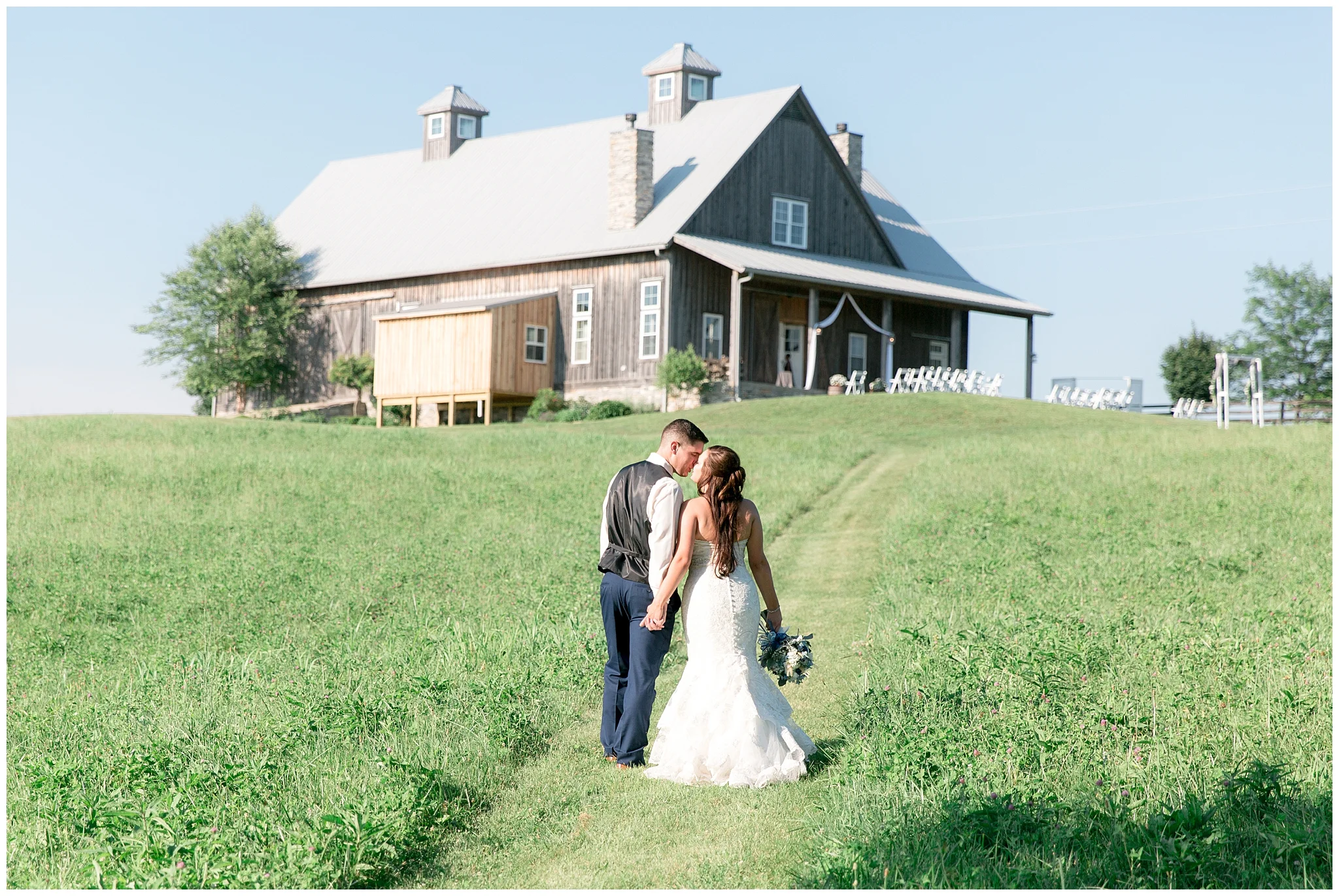 Long Ridge Farm was the perfect setting for the Nehez wedding last June. Breanne and Mitchell go as far back as high school and their love has only grown with time. From 10th grade English class to their wedding day, these two sweethearts are committed to forever! Breanne knew she would love Mitchell for the rest of her life the day their son’s life began. Seeing him become a dad was so precious to her and their baby boy played a special role on proposal day and wedding day. When Mitchell proposed, he had their son in a onesie that said, “Mommy will you marry Daddy?” When it came time after the “I Dos” their son walked down the aisle with them into the perfect getaway car. Breanne took the reins as the planner for her wedding. Her advice for brides trying to do the same is to not stress, that it will all fall into place; and it sure did! From the floral invites, to the customized bridal robes, every detail was stunning on the big day. The reception wrapped up the Nehez wedding day with a bang! Catering was done by Mark’s Feed Store in Louisville and the DJ Buddy Irvin made sure to keep the crowd dancing. After digging in to their flawless cake by Darlene Nold, the couple swayed to the music until this perfect day was over.