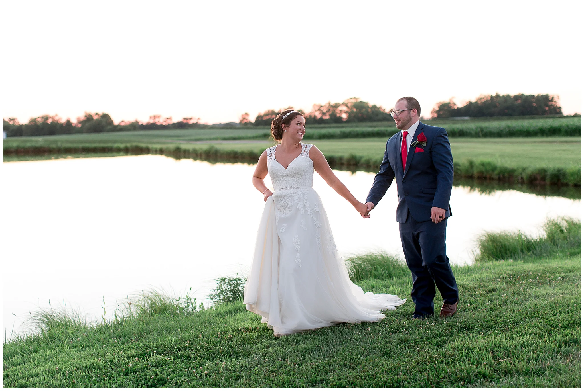 When I said I was finished blogging all of my 2018 weddings I wasn’t telling the full truth. I was holding this one for the 4th of July because this wedding took place during 4th of July weekend last year. Wendy and John got married on July 7, 2018 at Gallrein Farms in Shelbyville, Ky. This wedding was full of red, white and blue from the grooms socks, to the red bridesmaid dresses and navy groomsmen suits. The day ended with a beautiful sunset and pictures by the water. Wendy’s dad even brought down his 69 Camero Z28 to snap a few pictures with. Everything about this day was exactly the way Wendy and John wanted it and it was perfect. Happy 4th of July everyone, I hope you all enjoy this wedding :)