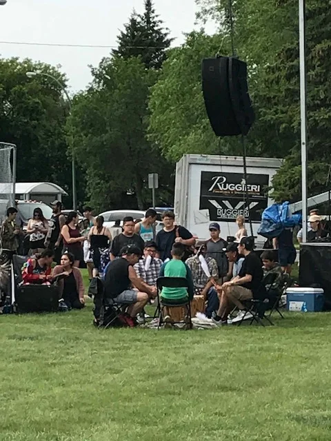 Traditional drum-circle performance.