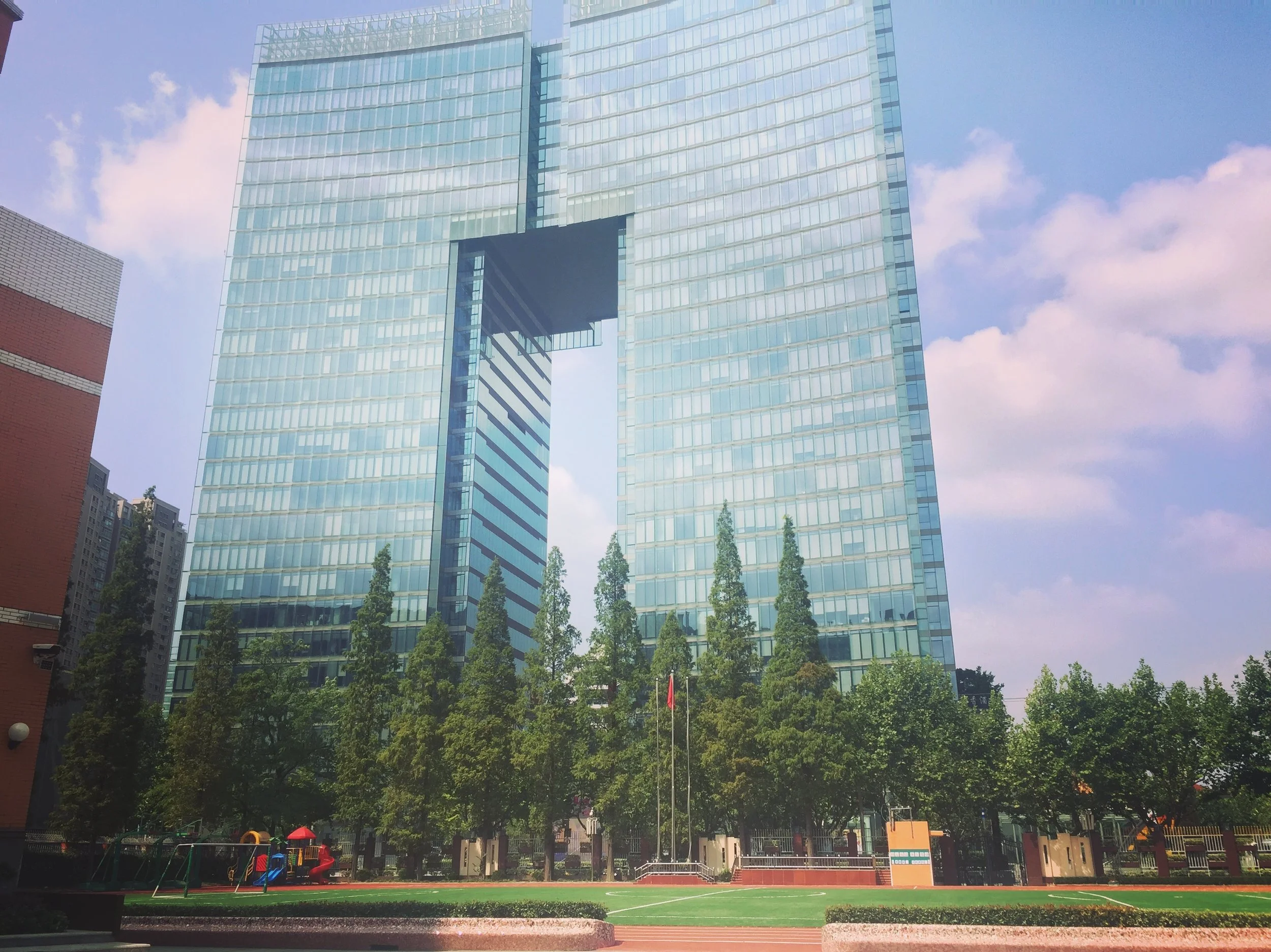 Many buildings in Shanghai have this square architecture. 