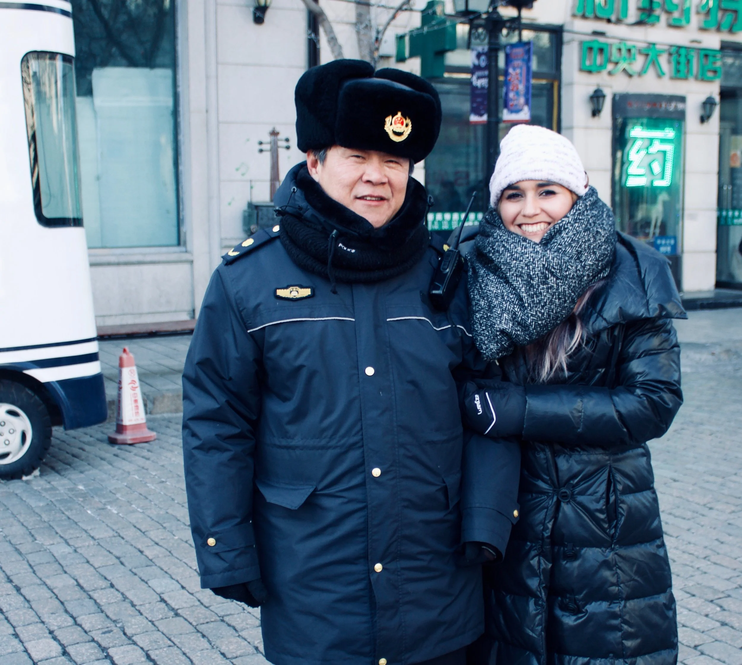 I was jealous so of course I wanted a picture with the Chinese police officer with the Russian hat.