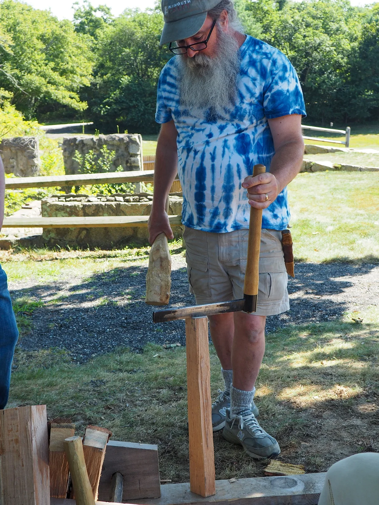 Peter riving a post
