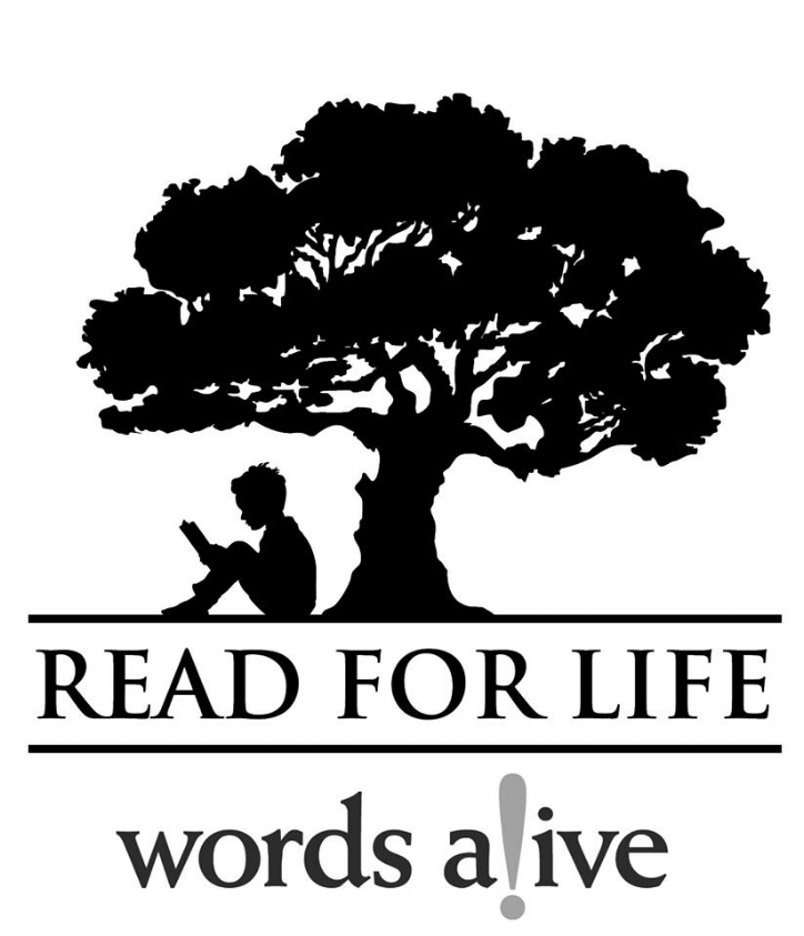 Image of a child reading under a tree with the words “Read for Life”. Via Words Alive