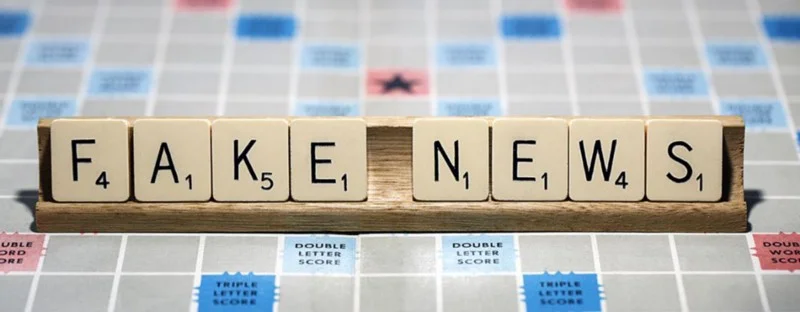 “Fake News” spelled out in Scrabble Tiles. Image via the American Library Association