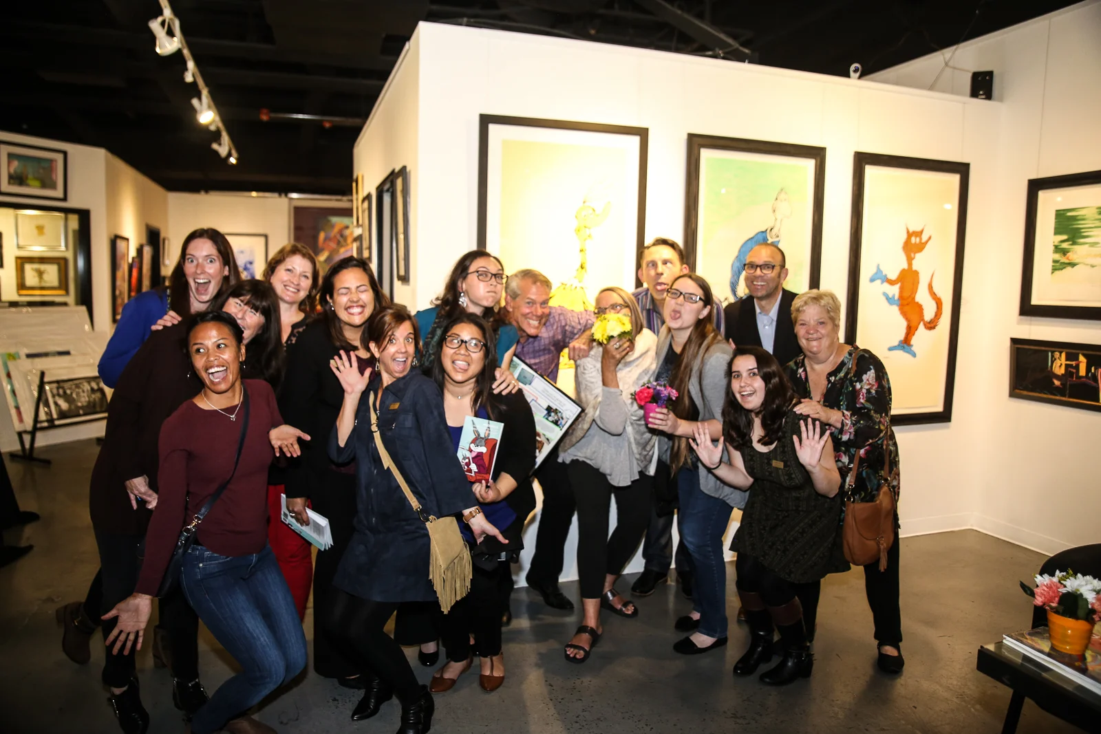 Say Cheese! Chuck Jones Center for Creativity and Words Alive staff and volunteers celebrate the students' work at the exhibit. 