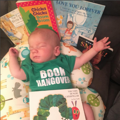A #shelfie from last year's Share Your Love of Reading campaign! The picture features a young baby surrounded by books! You're never too young to start reading!
