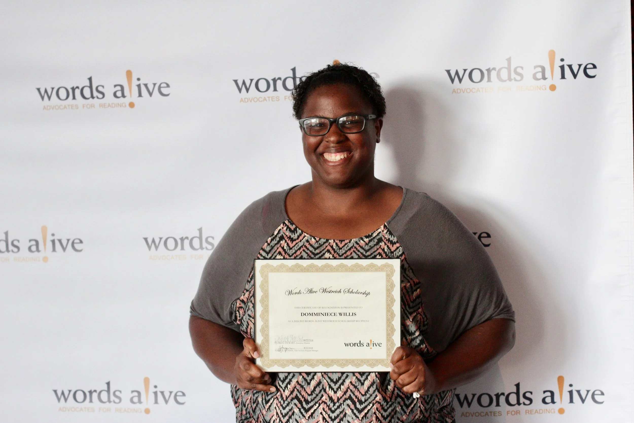 An image of Domminiece Willis standing at the 2018 WAWS Award Ceremony.