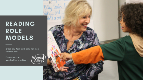 A graphic that shows one of our volunteers holding up a book while a student points at it. The text says, “Reading Role Models: What are they and how can you become one?”
