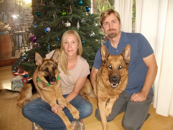 Amy and Dave with their two GSDs, Bart and Lola