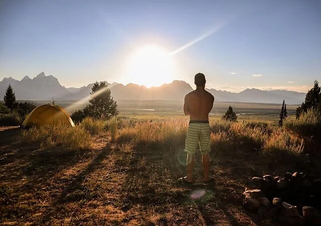 This was &ldquo;home&rdquo; for a few nights  on last summer&rsquo;s tour. Had to make a pit stop in the Grand Tetons. It was quite the spot to cook, sit by the fire, and watch the sun set behind the Teton Mountain Range before hitting the hay.

#gra