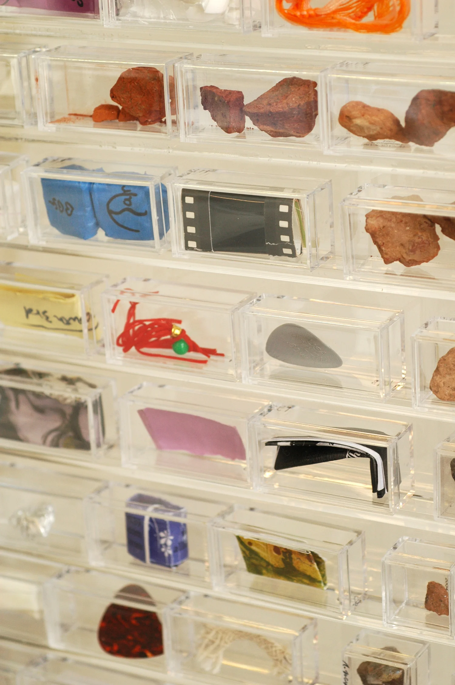Tsunagu-Wall Detail: Wall is constructed by small piece of bricks in plastic box. The original bricks are from my City Root project (2002), some of the bricks were exchanged to other object from all over the world.