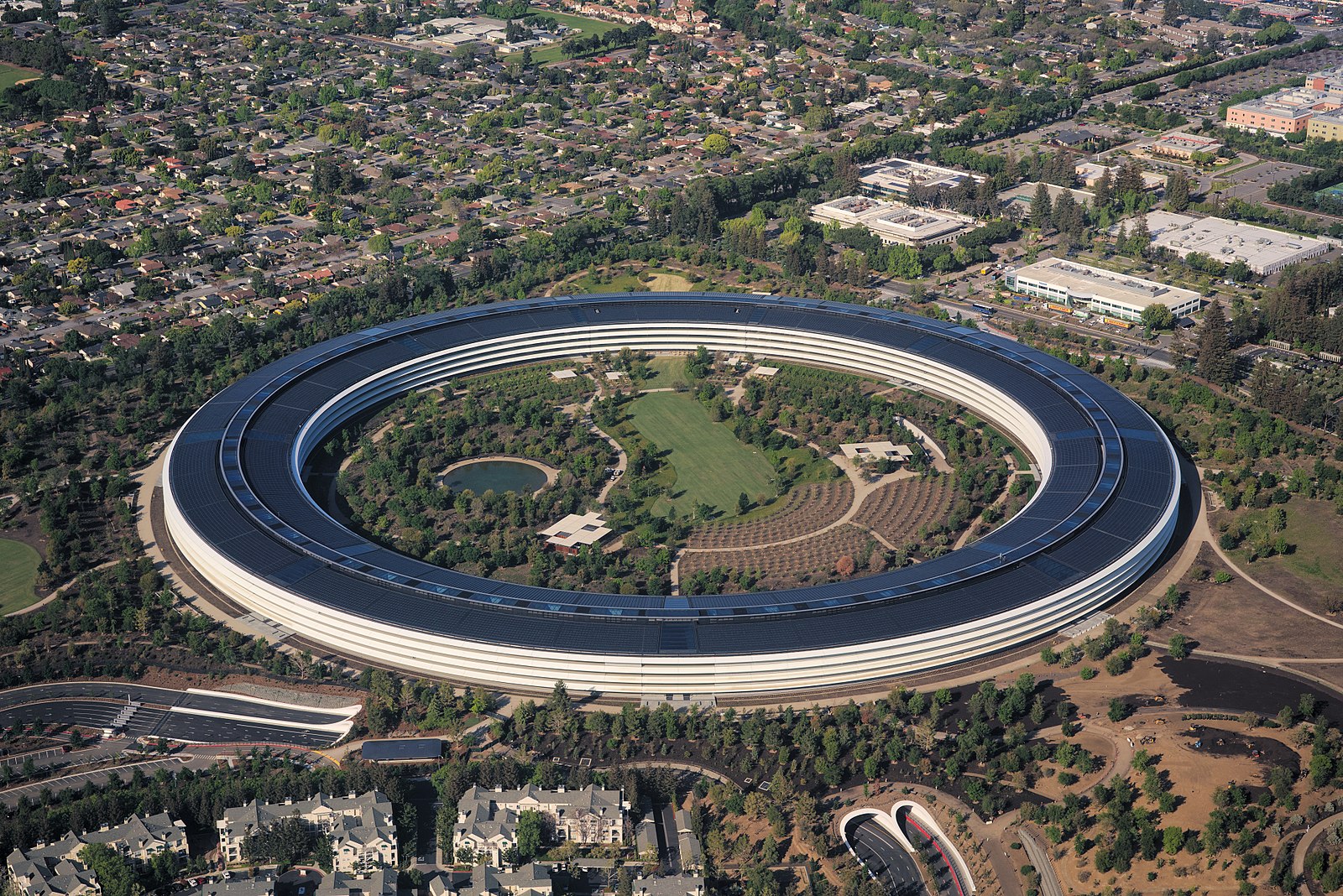 Apple Park in Cupertino, California is a perfect circle and epitomises the company's rigorous design philosophy and was intended to represent a refuge, with a pond and drought-tolerant landscaping at its centre, but has been criticised for being inward-looking. Image Source: Wikipedia