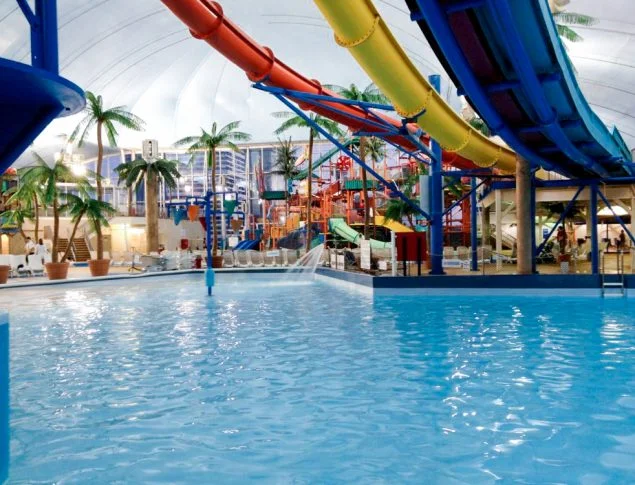 1. Fallsview Indoor Water Park Location: Niagra Falls, Ontario, Canada Scope: Natare created the PVC membrane, uni wall pools, elevated wave pool, surge tanks and provided the installation for these as well. Flooring: NataDek Flooring Waterpark Size: 11,613 sq. meters Completed: 2006