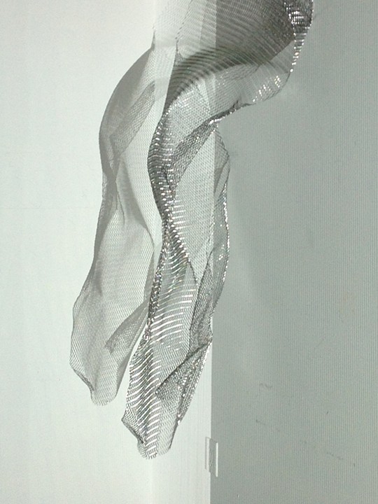 "UNTITLED", metal mesh, projected light on object, 2013