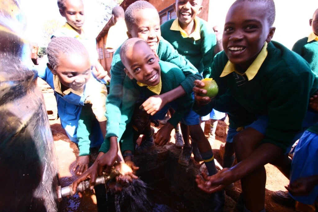 embu-school-children-enjoying-their-new-water-supply_5163480971_o.jpg