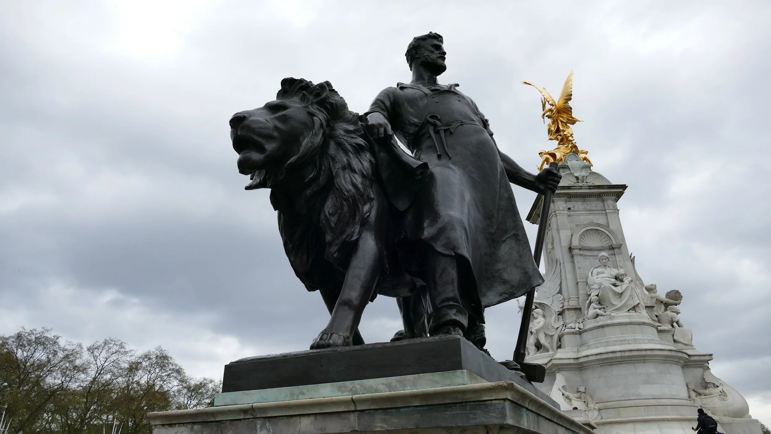 A sculpture in the Mall in front of Buckingham Palace. That's the Victoria Monument in the background.