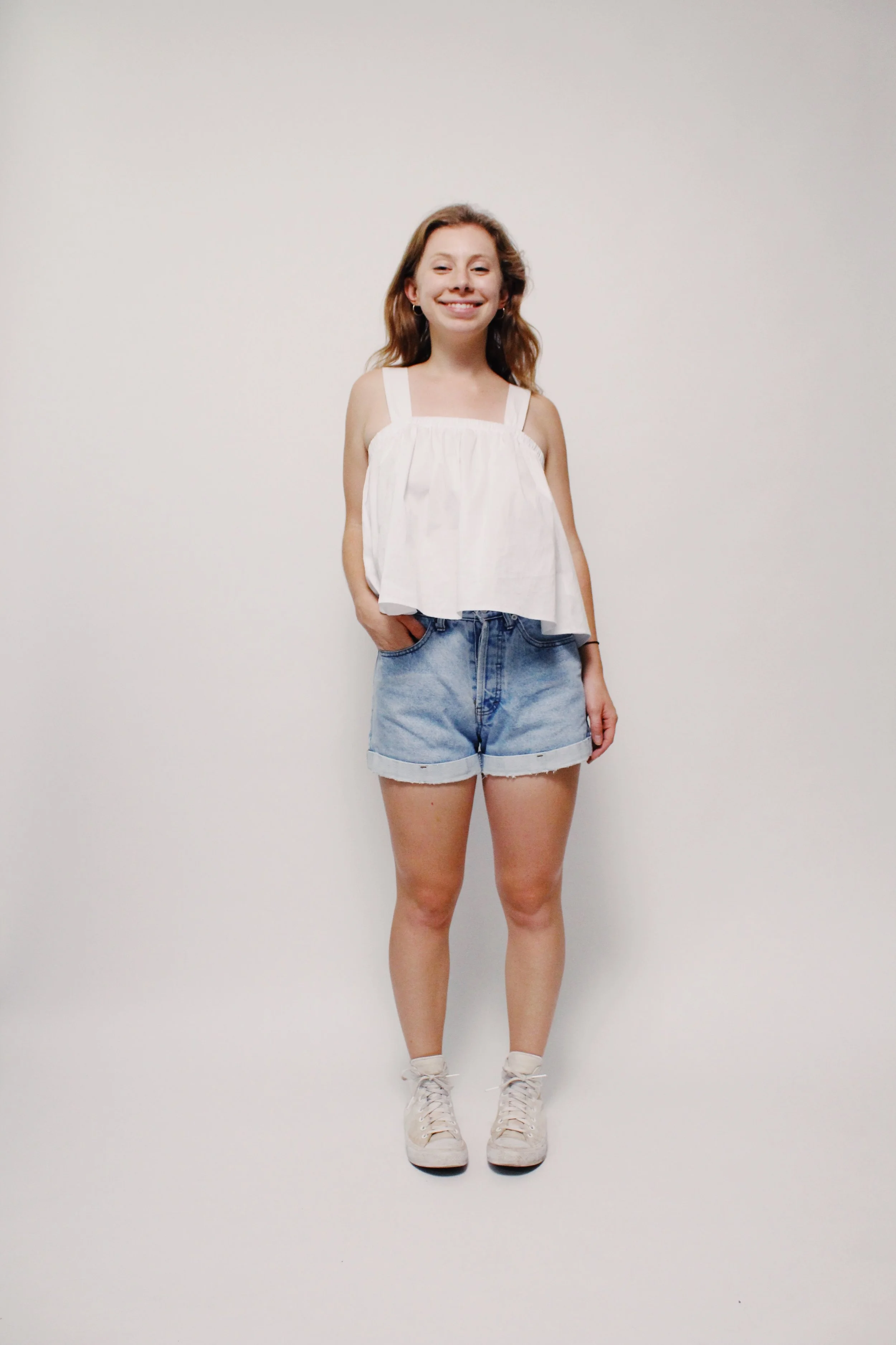 black converse and shorts