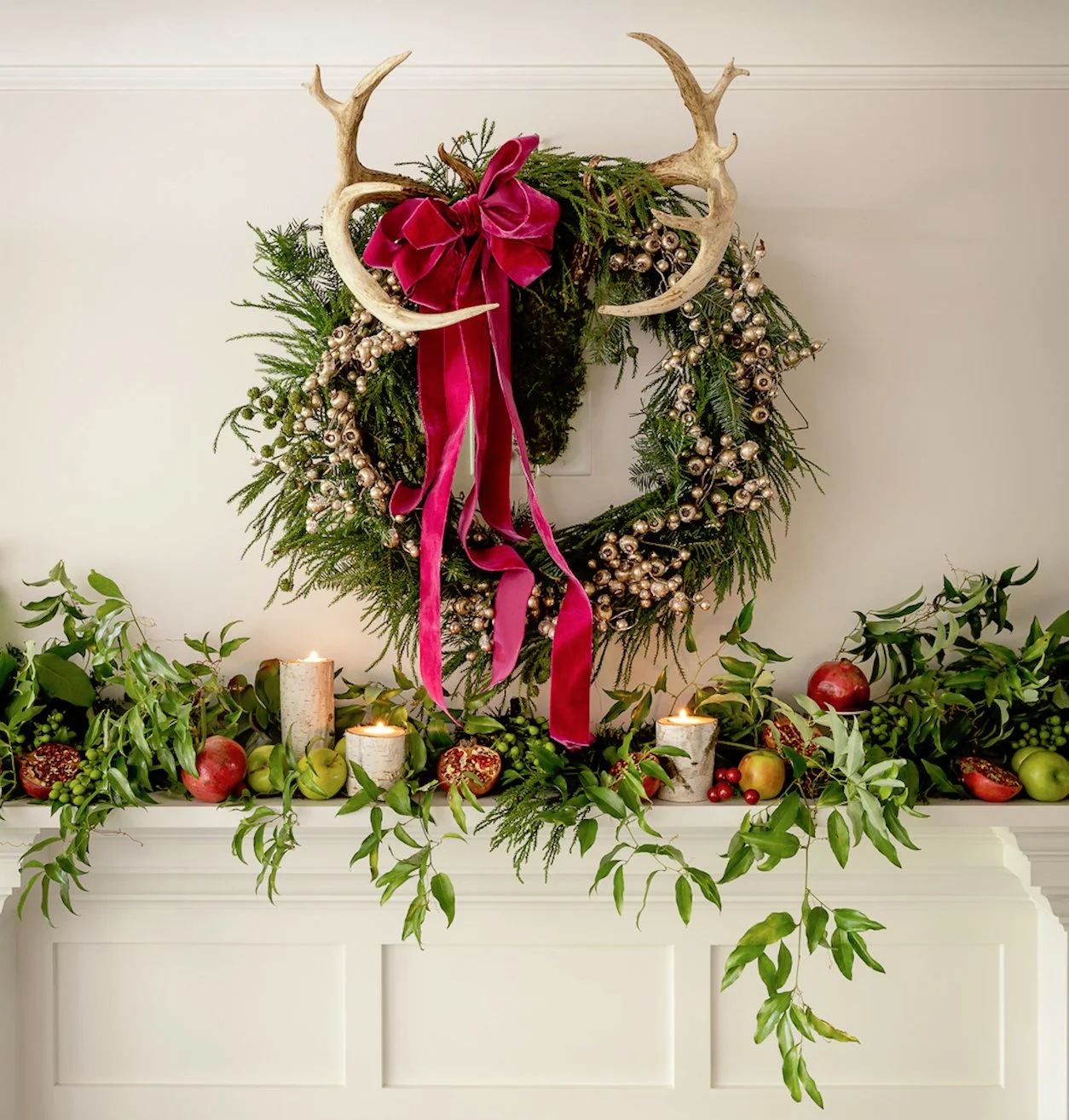 The mantle features local foliage, pomegranates, and apples.