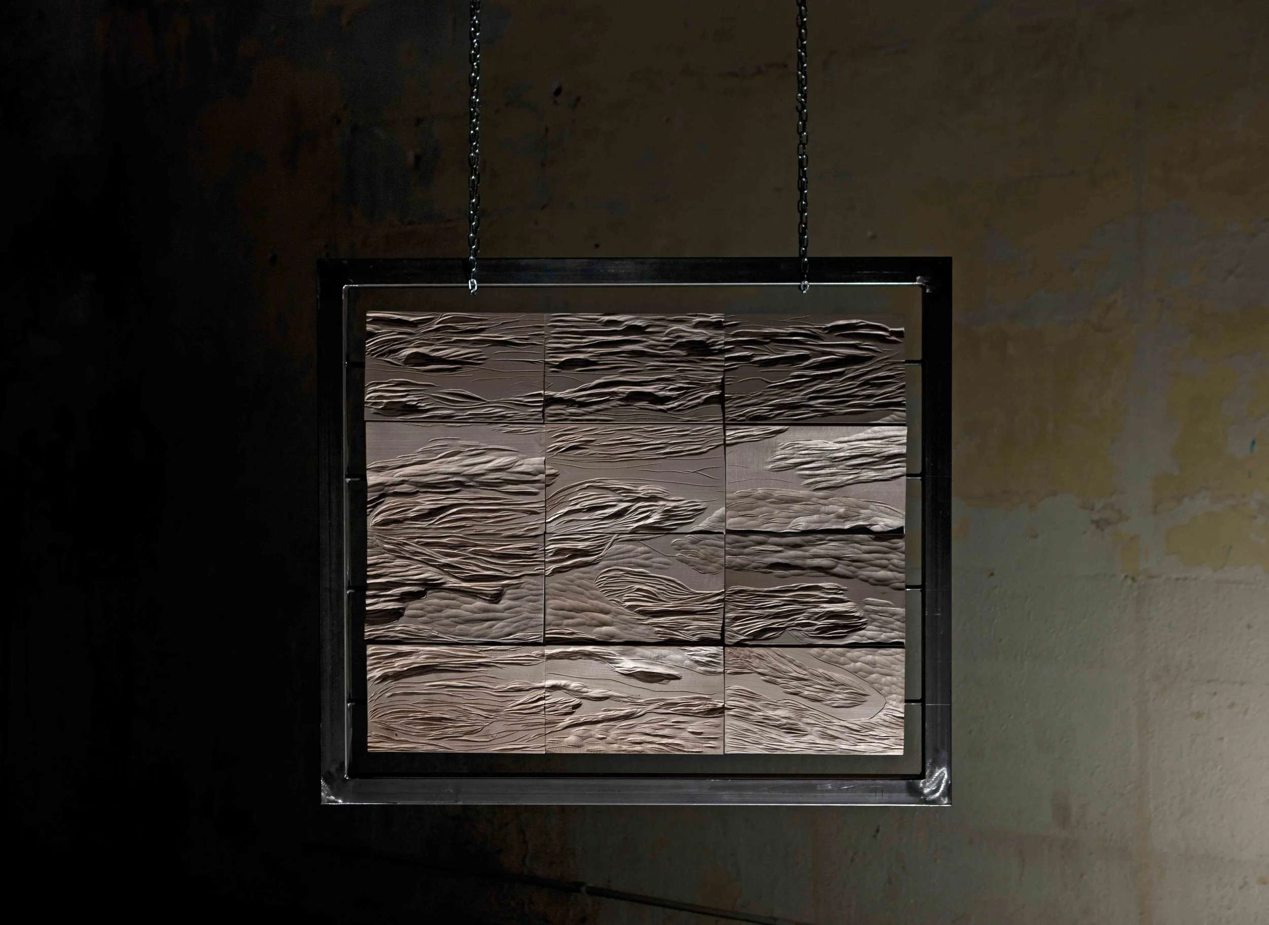 Olas de mujer - 2017 Installation of 12 basswood panels and iron frame - 31 x 36 in