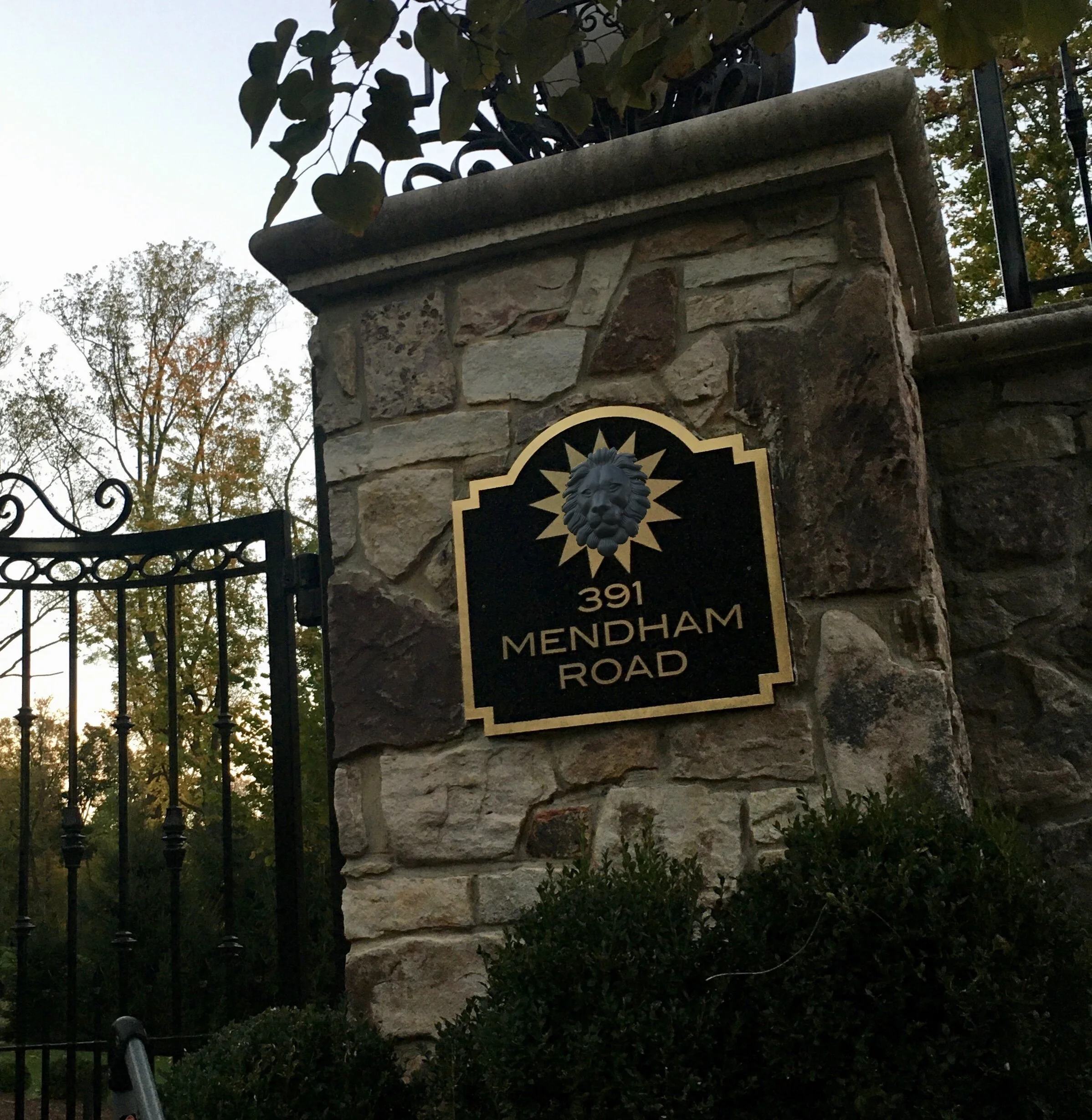 We just finished this fierce looking sign for an estate in Bernardsville NJ. It features raised 23K gold leaf letters over a crushed glass smalts background. The lion head in the star’s center is 3d carved.