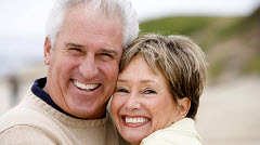 A picture of happy clients who received removable denture service from Royal Jubilee Denture Clinic in Victoria BC.