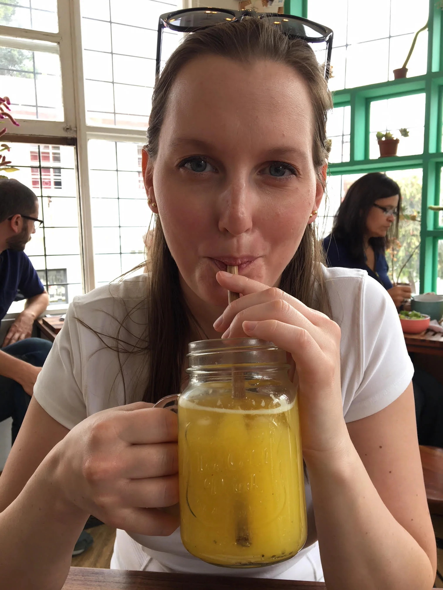 Me, Lily, drinking through a bamboo straw.