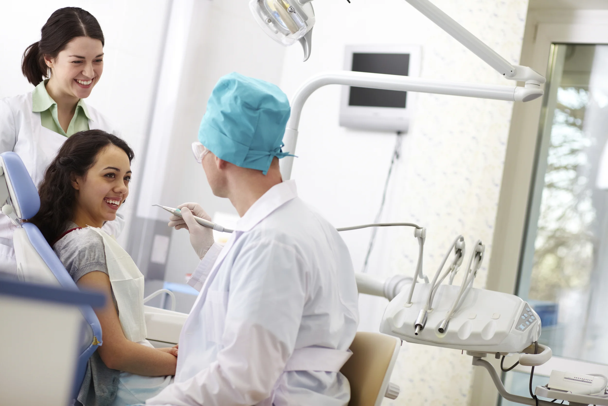 smiling_patient_dentists.jpg