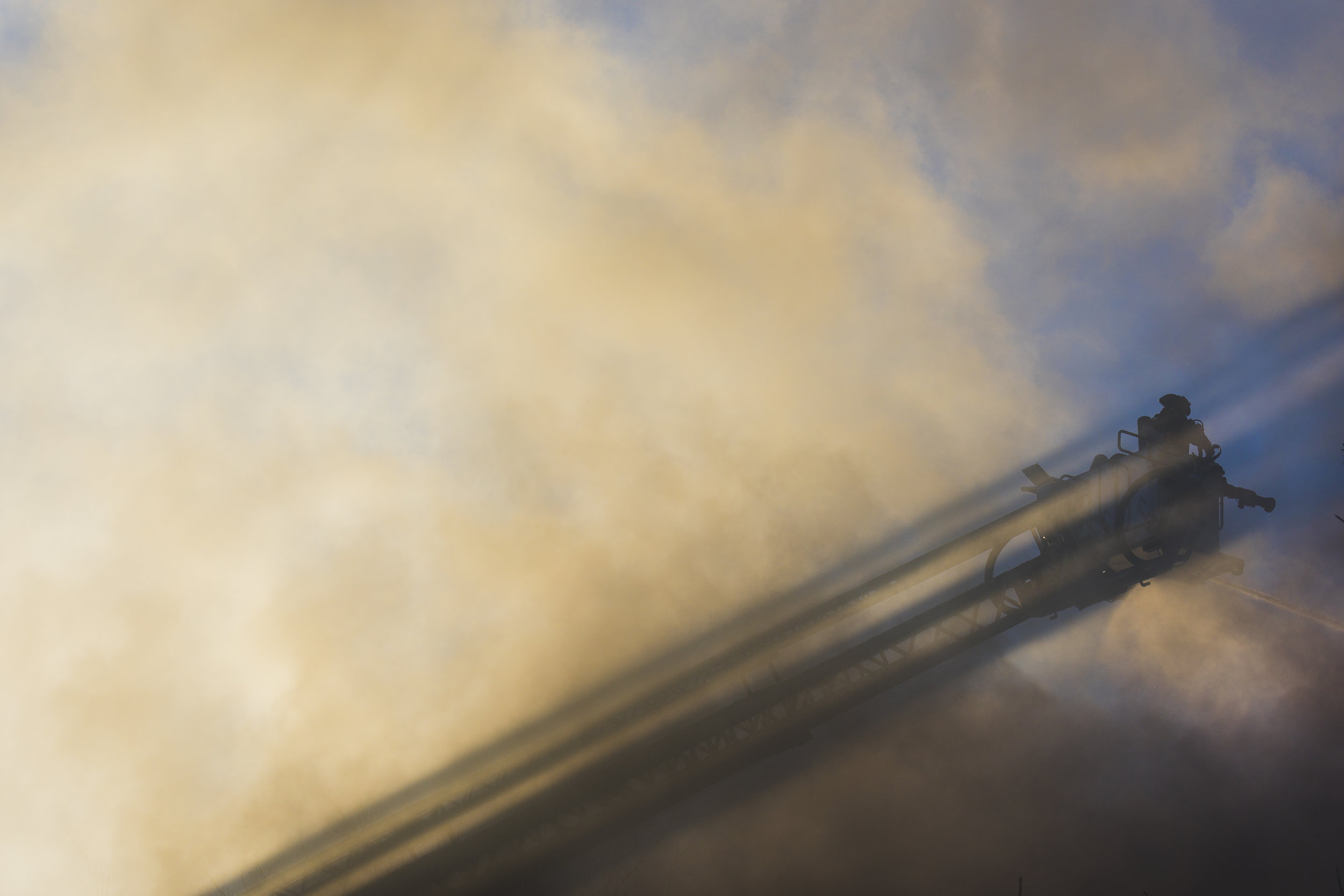 Firefighters respond to a fire at the Carriage Hill Apartments in Athens, OH after the building caught fire and quickly spread to 30 consecutive units on February 26, 2017.