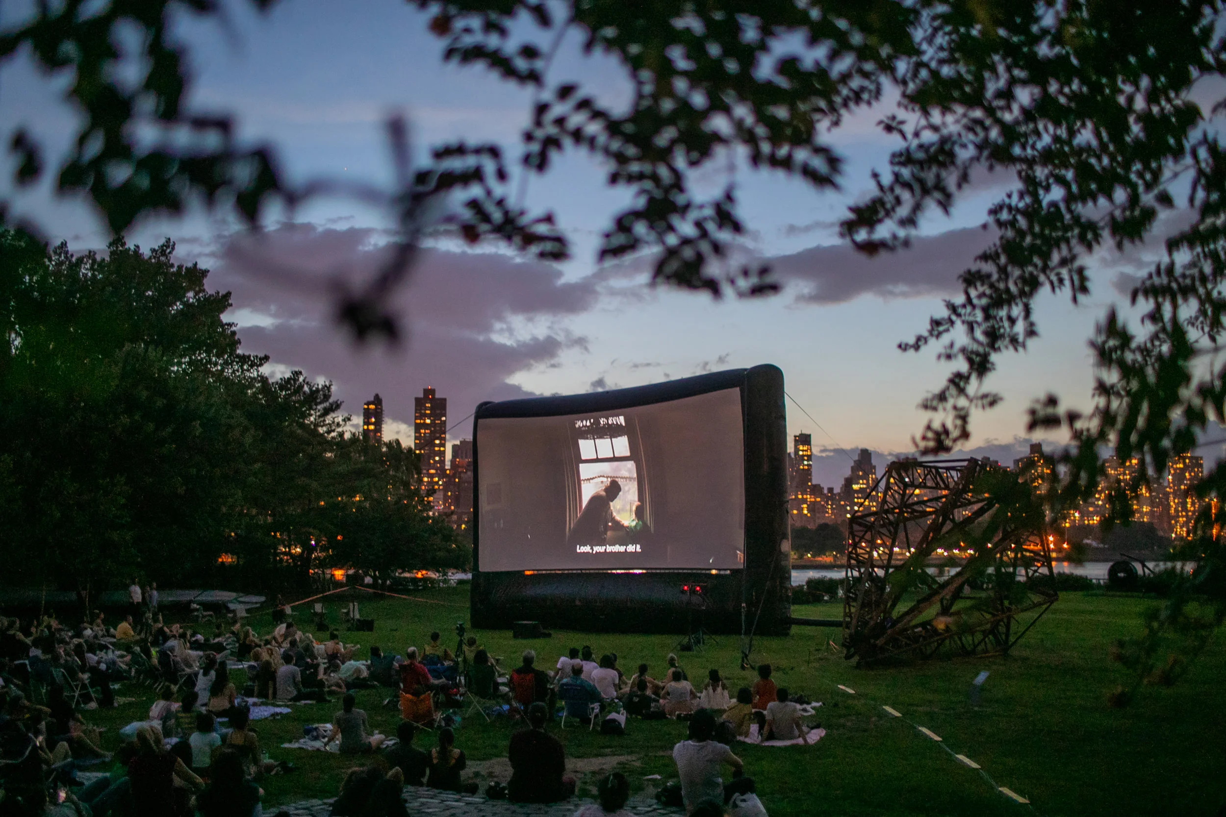 An outdoor film at Socrates Sculpture Garden in Astoria, Queens photographed for the Arts & Leisure section.
